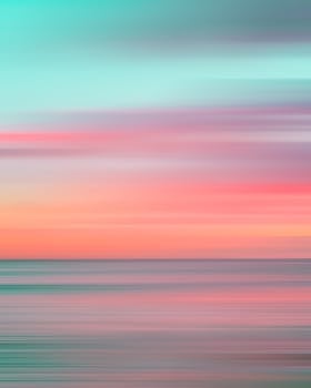 pexels-photo-4321069-4321069 Colorful motion blur capturing a stunning Hawaiian sunset over the ocean.